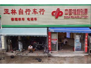 UPDATE - Nearly 80,000 evacuated as typhoon lashes south China