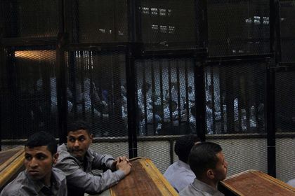Egyptian court sentences 11 fans to death more than soccer riot