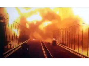 UPDATE 2 - Huge fire erupts on strategic bridge linking Crimea to Russia