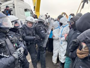 UPDATE 2 - German police start removing barricades at climate protest camp